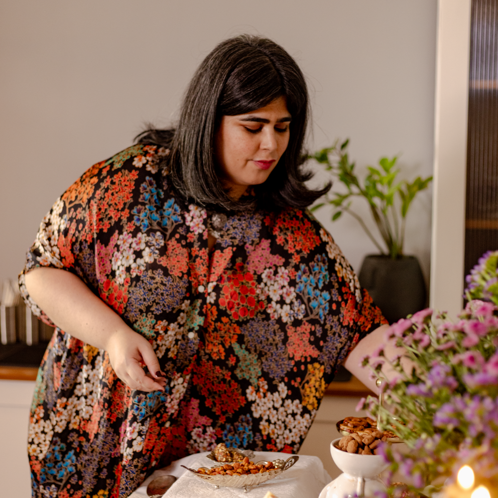 celebrated stylist Spardha Malik laying a table with healthy eatables from Bruijn like savoury nuts