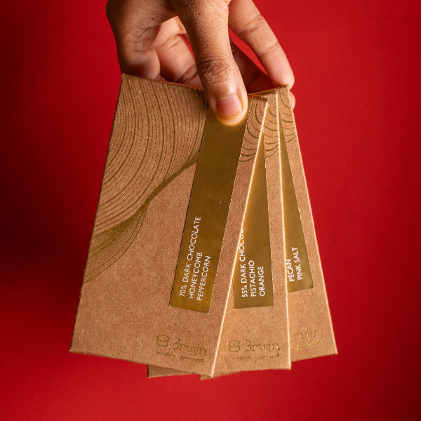 Smooth, thin chocolate bars in bold flavors: Pecan & Pink Salt, Coffee & Hazelnut, Honeycomb & Peppercorn, Pistachio & Orange Zest.