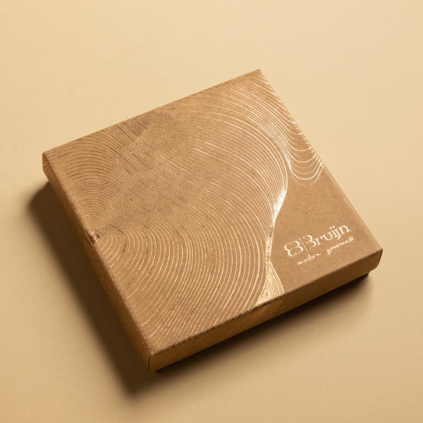 Gift box on a beige background