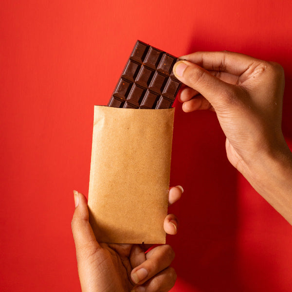 Smooth, thin chocolate bars in bold flavors: Pecan & Pink Salt, Coffee & Hazelnut, Honeycomb & Peppercorn, Pistachio & Orange Zest.