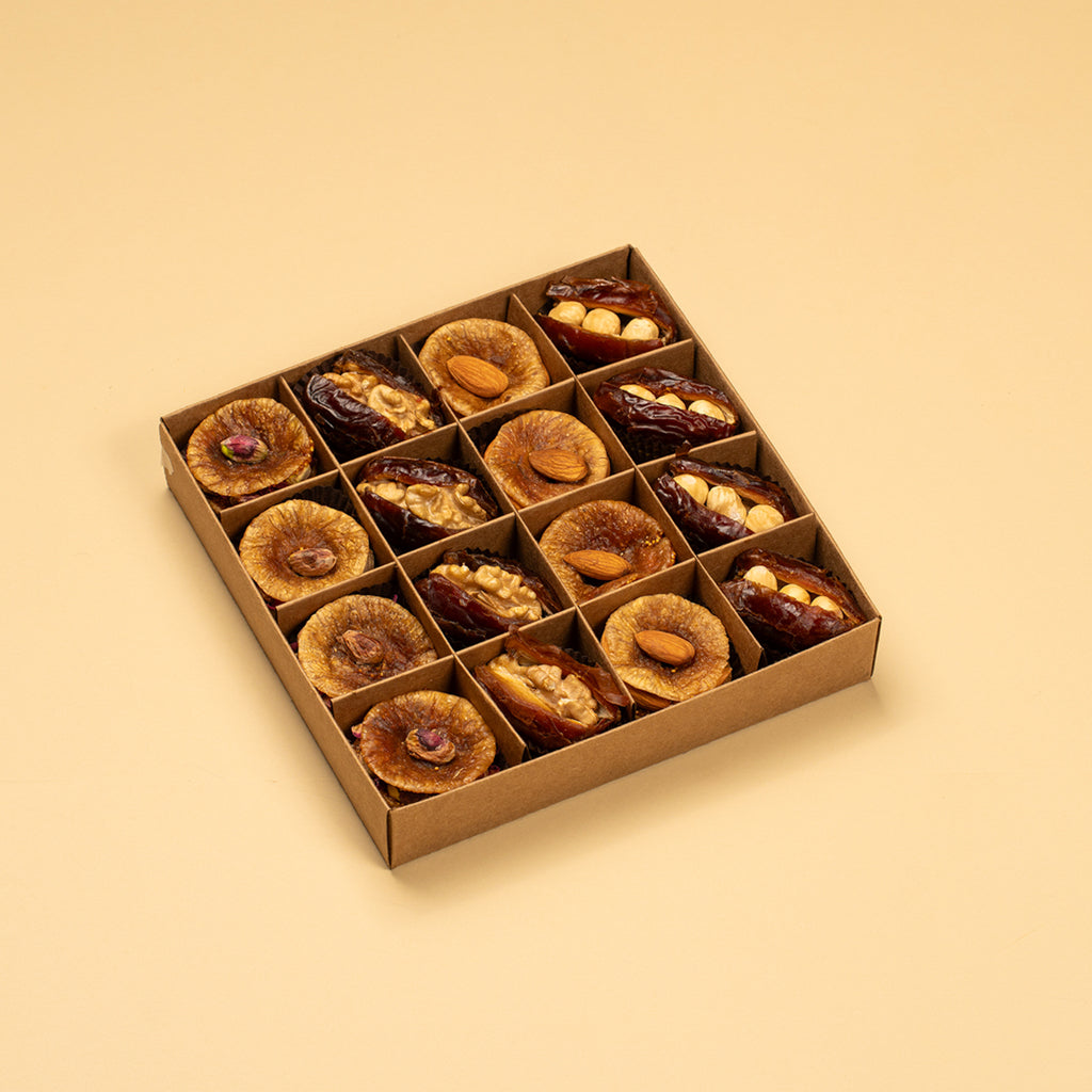 a box with stuffed dates and stuffed figs