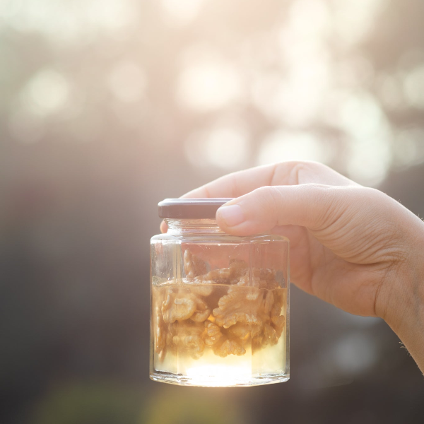 Raw Acacia honey and walnuts