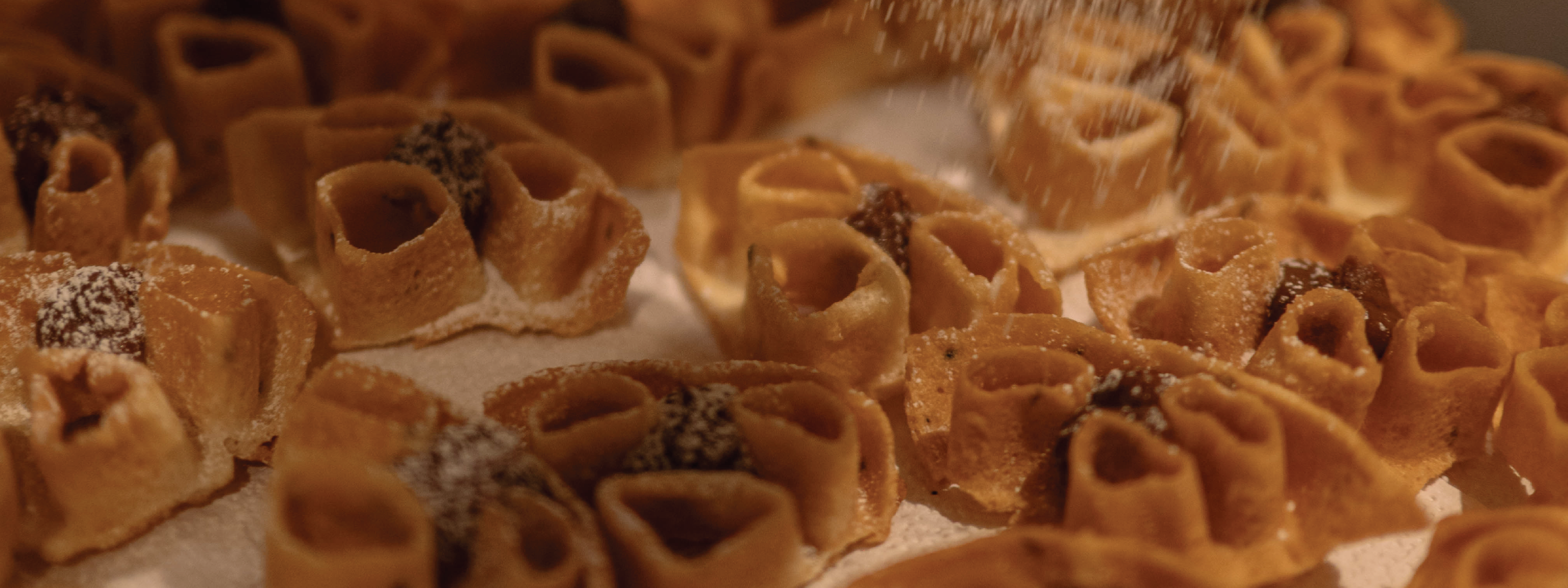 Kashmiri Walnut Date Fudge on traditional South Indian rose cookies
