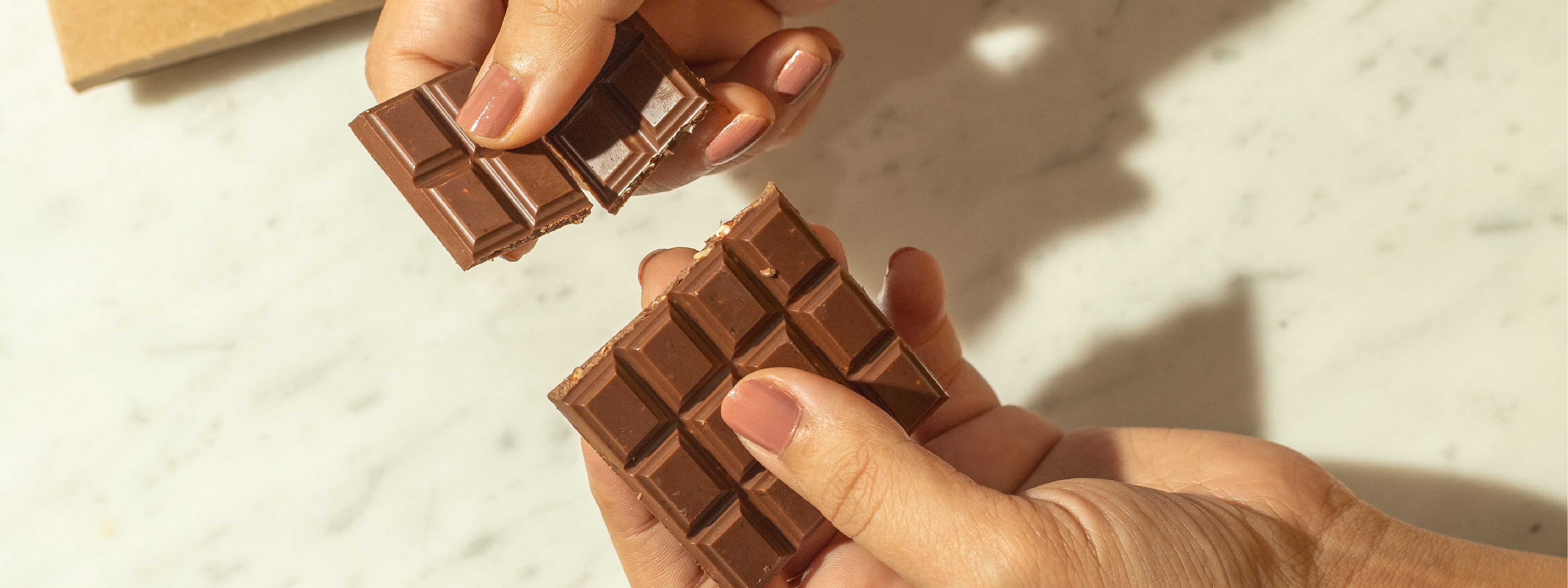 Our chocolate bar snap available in four unique flavors in vegan Indian chocolate from Idduki