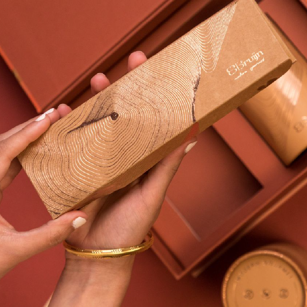 craft box that contains stuffed dried fruits like dates, walnuts and figs