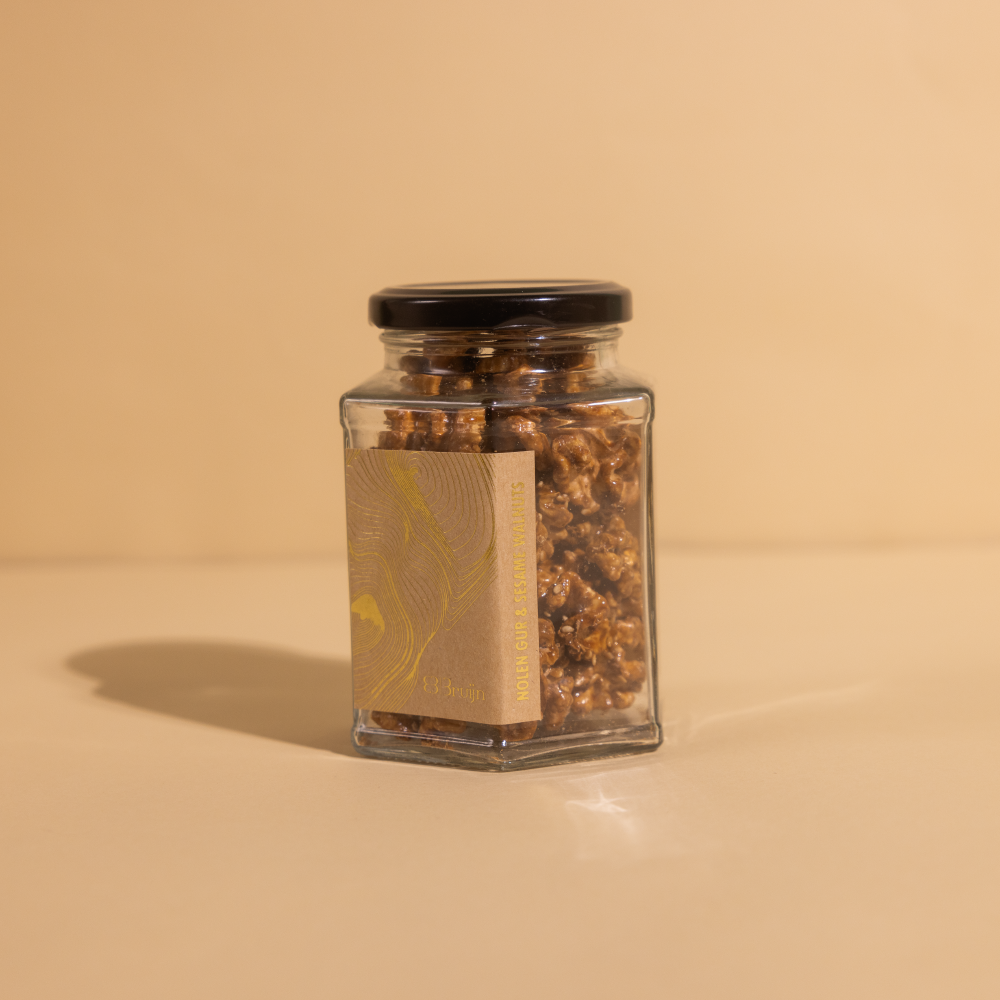 Roasted walnuts caramelised with date sap jaggery and sprinkled with white sesame