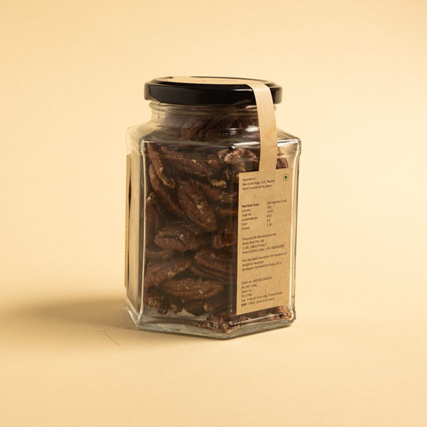 Glass jar with roasted peanuts 