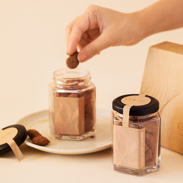 Caramelised almonds dipped in chocolate and dusted in cocoa, great as a dessert snack 