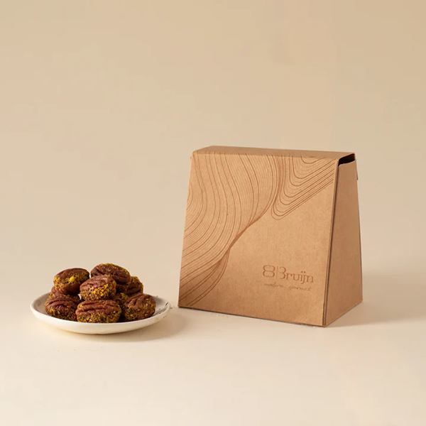 American pecans stuffed with a pure date and cardamom paste for healthy, gourmet snacking