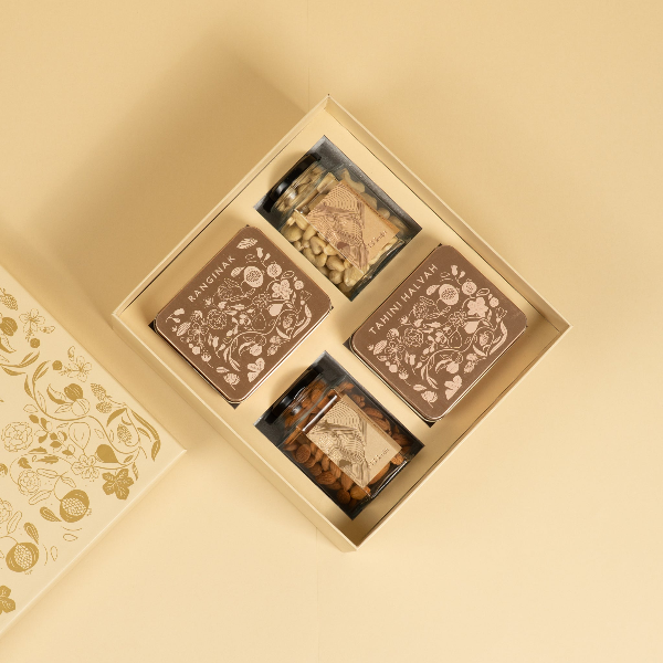 A complete gift box that houses our popular tin Specials along with two large-pack sized savoury nuts.