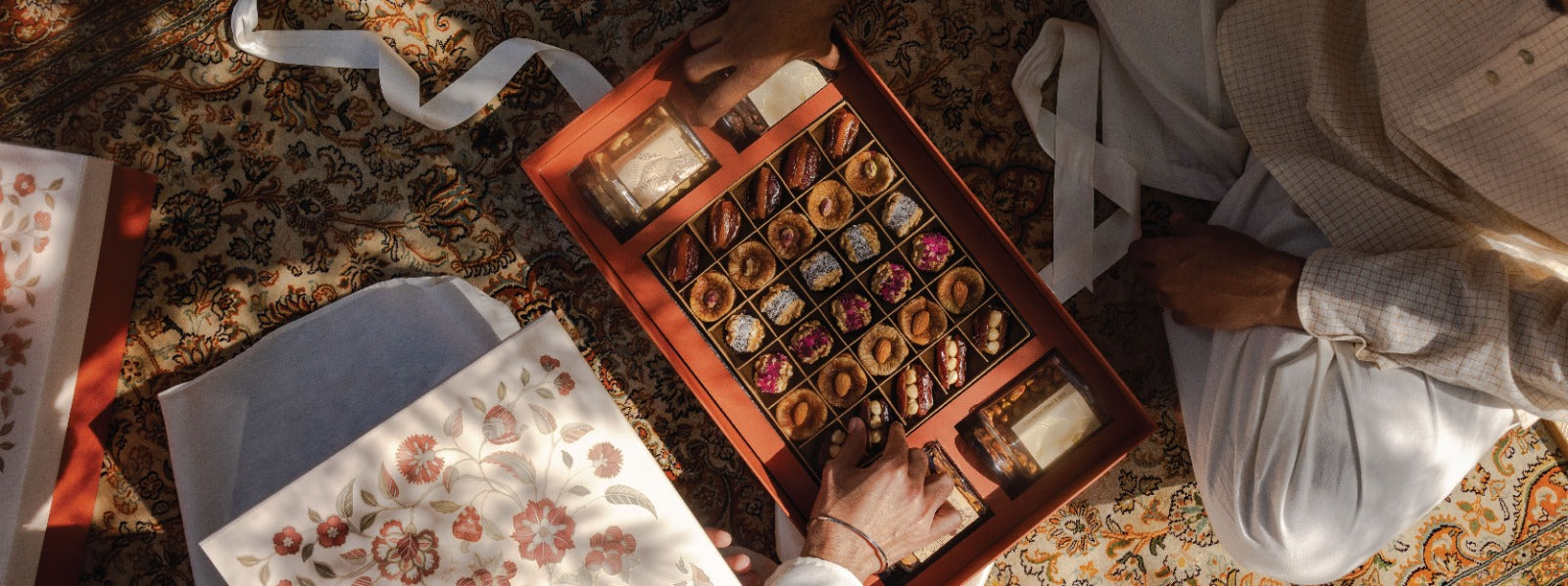  massive gift set that contains both 30 dried fruits like stuffed dates, figs and walnuts  and 4 large savoury and/or sweet nuts jars of your choice.