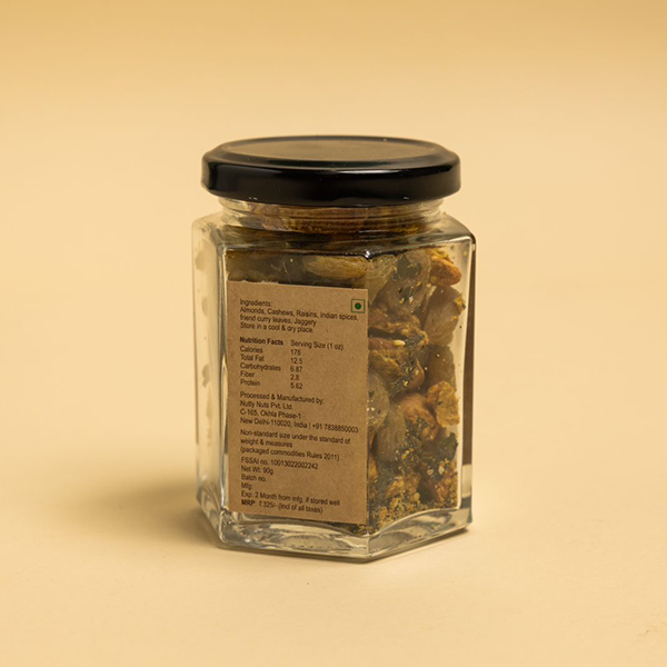 Jar of spiced nashta nuts – 90g mix of almonds, cashews, raisins, and curry leaves.