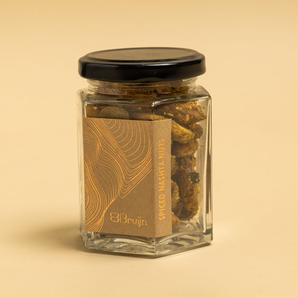 Jar of spiced nashta nuts – 90g mix of almonds, cashews, raisins, and curry leaves.