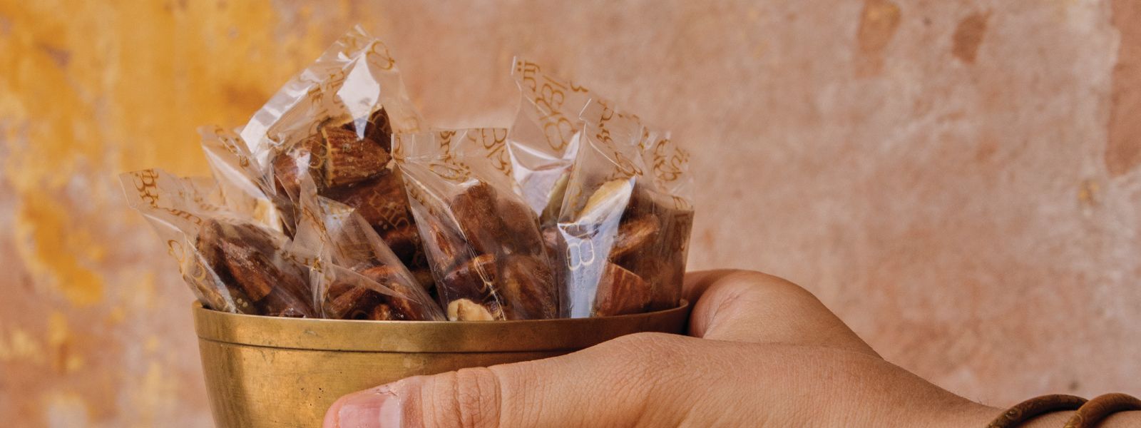 Individual dates, pecans, walnuts and figs wrapped for easy travel and quick consumption.