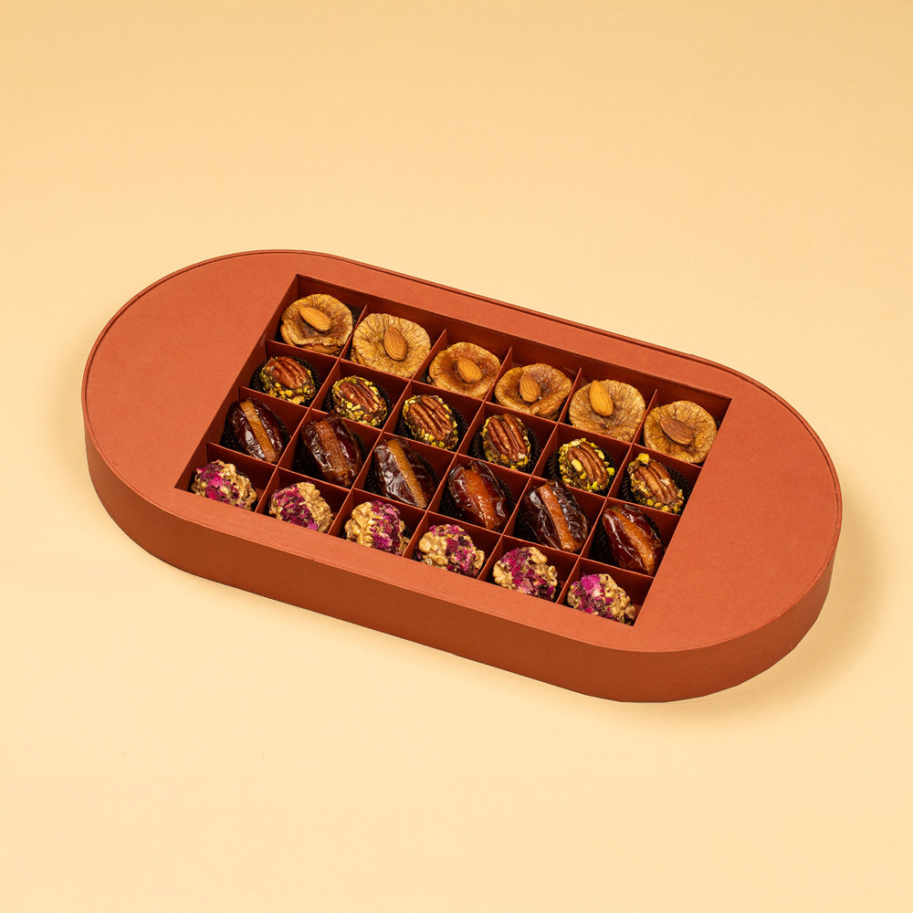 A handprinted illustration drawn by Jaamuni Samundar that holds 24 dried fruits  like dates, walnuts, pecans and figs stuffed with nuts