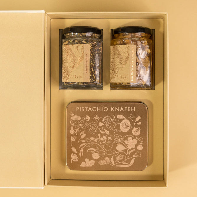 A birth announcement box with kehwa and honey and a delicacy called Pistachio knafeh inspired by the viral Dubai chocolate