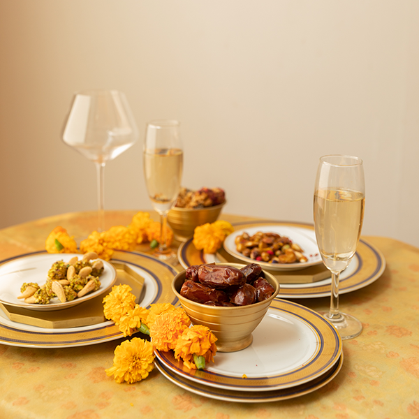 Salted roasted cashews dipped in caramel pistachio bits for Indian weddings and festivities 
