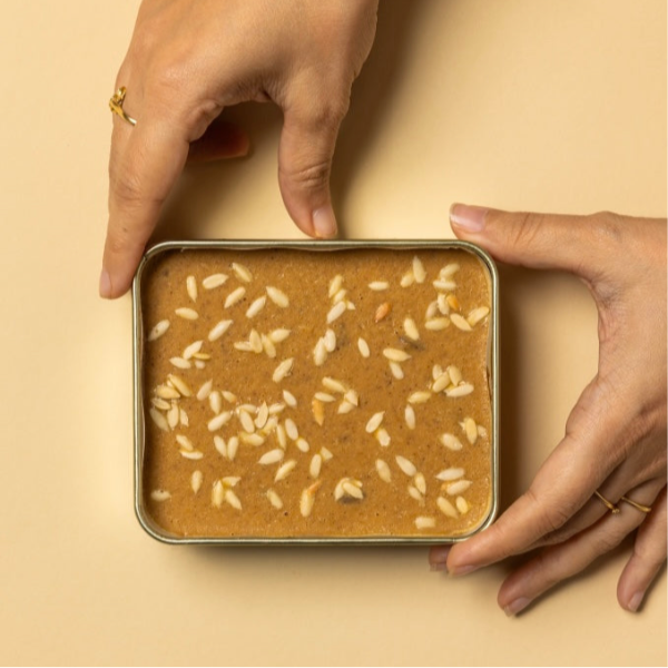 Ranginak - besan ki barfi sweetened by a bed of dates. Subcontinental Delicacies