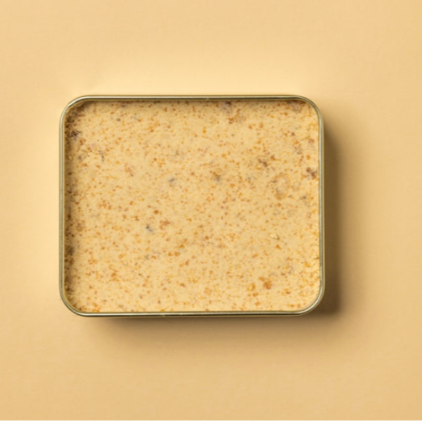 A rectangular tin containing Tahini Halvah, a Levantine dessert. Subcontinental delicacies as part of our Specials. 