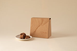 Roasted almonds caramelised in natural cane sugar and dipped in dark chocolate 