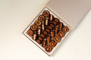 Opulent box with assorted figs, dates and pecan wholes for grand occasions and celebratory occasions